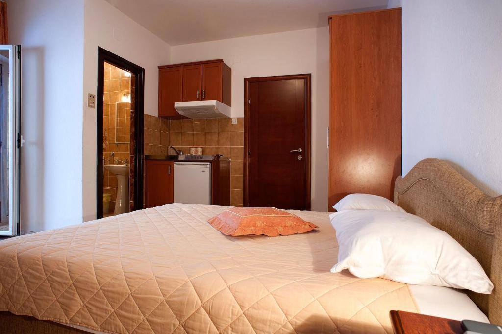 Apartments Vuksic Ilha Sveti Stefan Quarto foto
