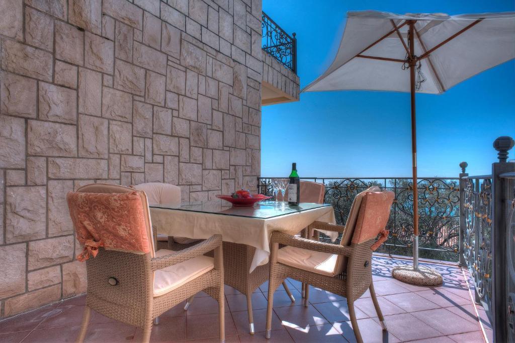 Apartments Vuksic Ilha Sveti Stefan Quarto foto